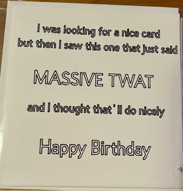Birthday card with humorous text on a plain background