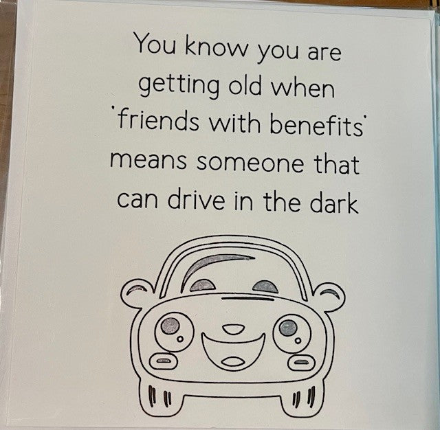 Card with humorous text and a cartoon car on a white background