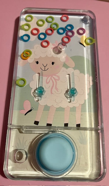 Sheep-themed hand held water game