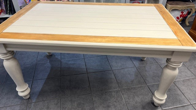 Large wooden table with sanded and sealed surround and hand painted legs and top