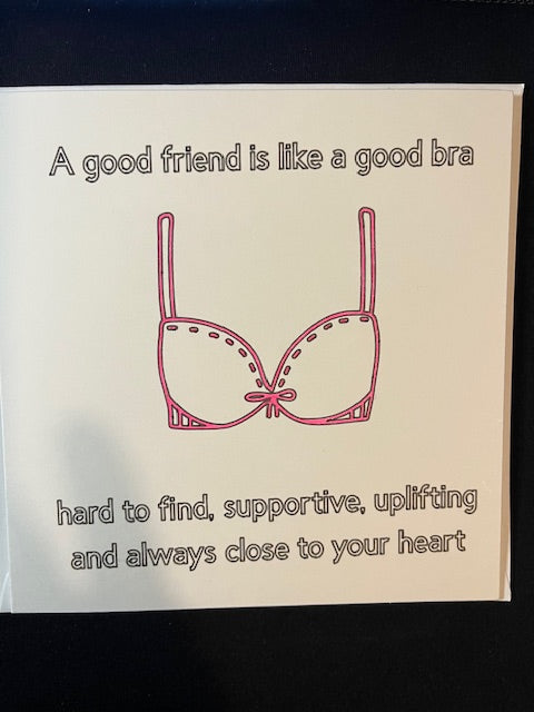 Card with pink bra illustration and text about the importance of girl friends on a white background
