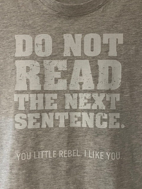 Grey t-shirt with white humorous text 