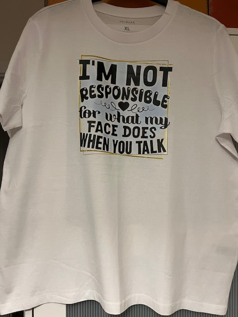 White t-shirt with printed text on a plain background