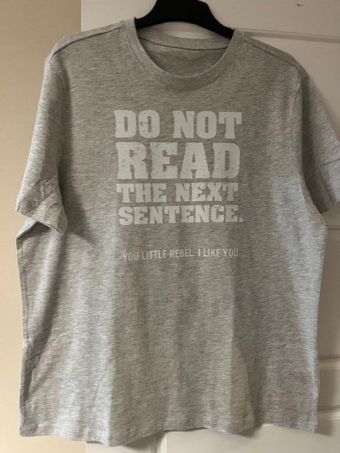 Grey t-shirt with white humorous text 