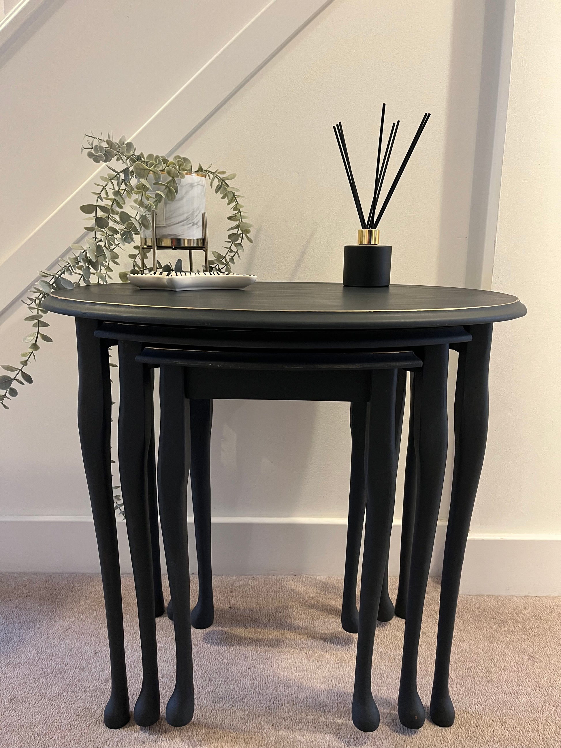 front view of three tables fully closed