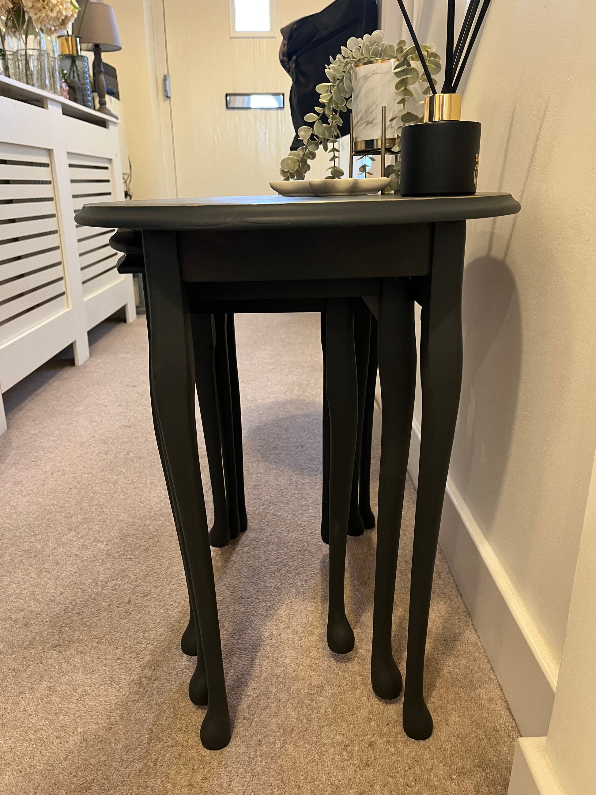 side view of three tables fully closed