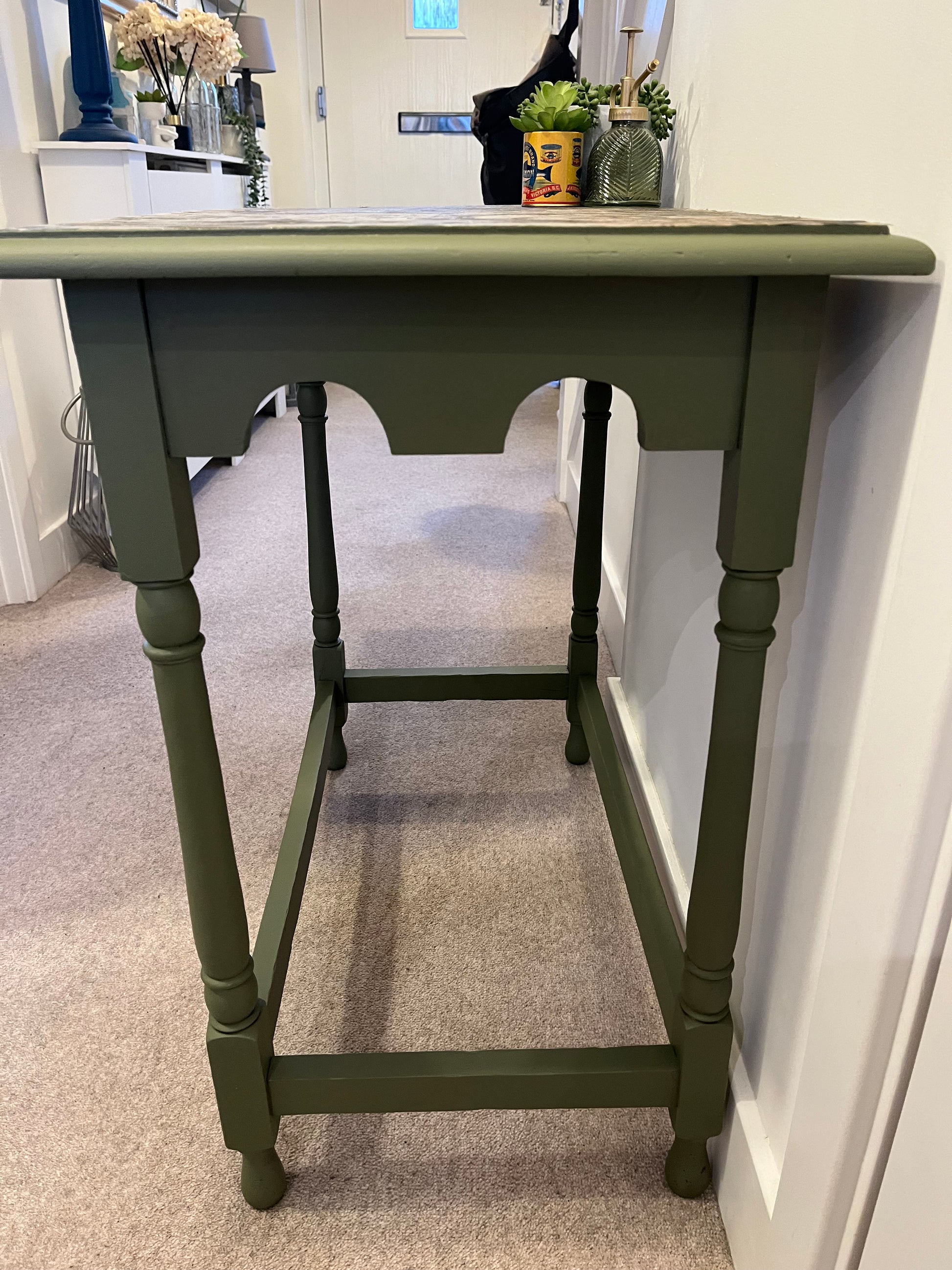 side view of green table legs and base