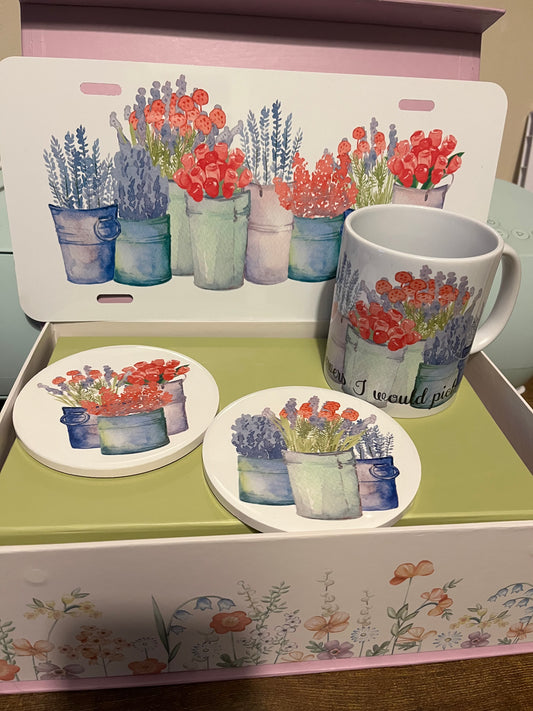 Set of ceramic coasters, mug and tin sign with floral designs 