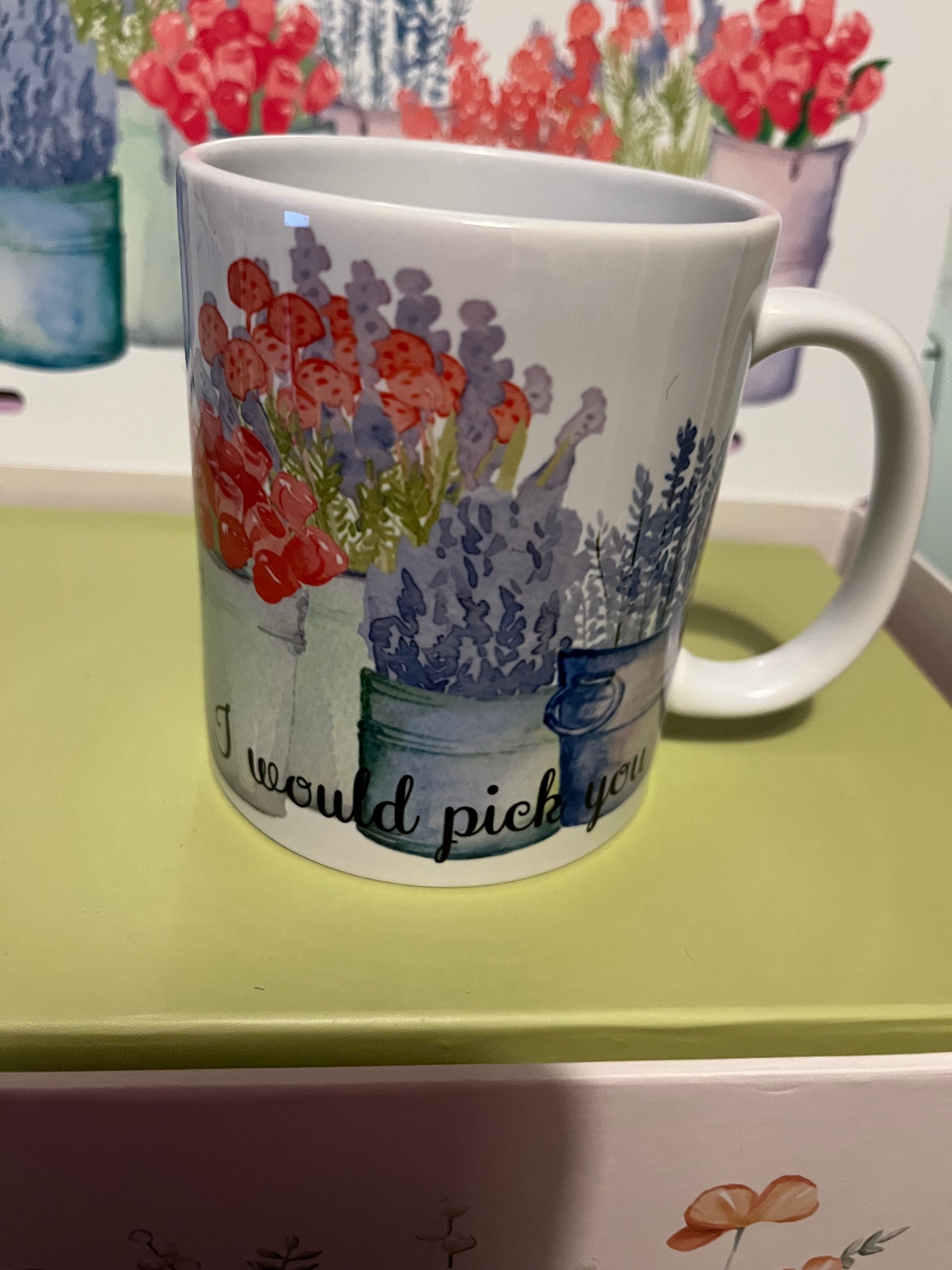 Mug with floral design and text 