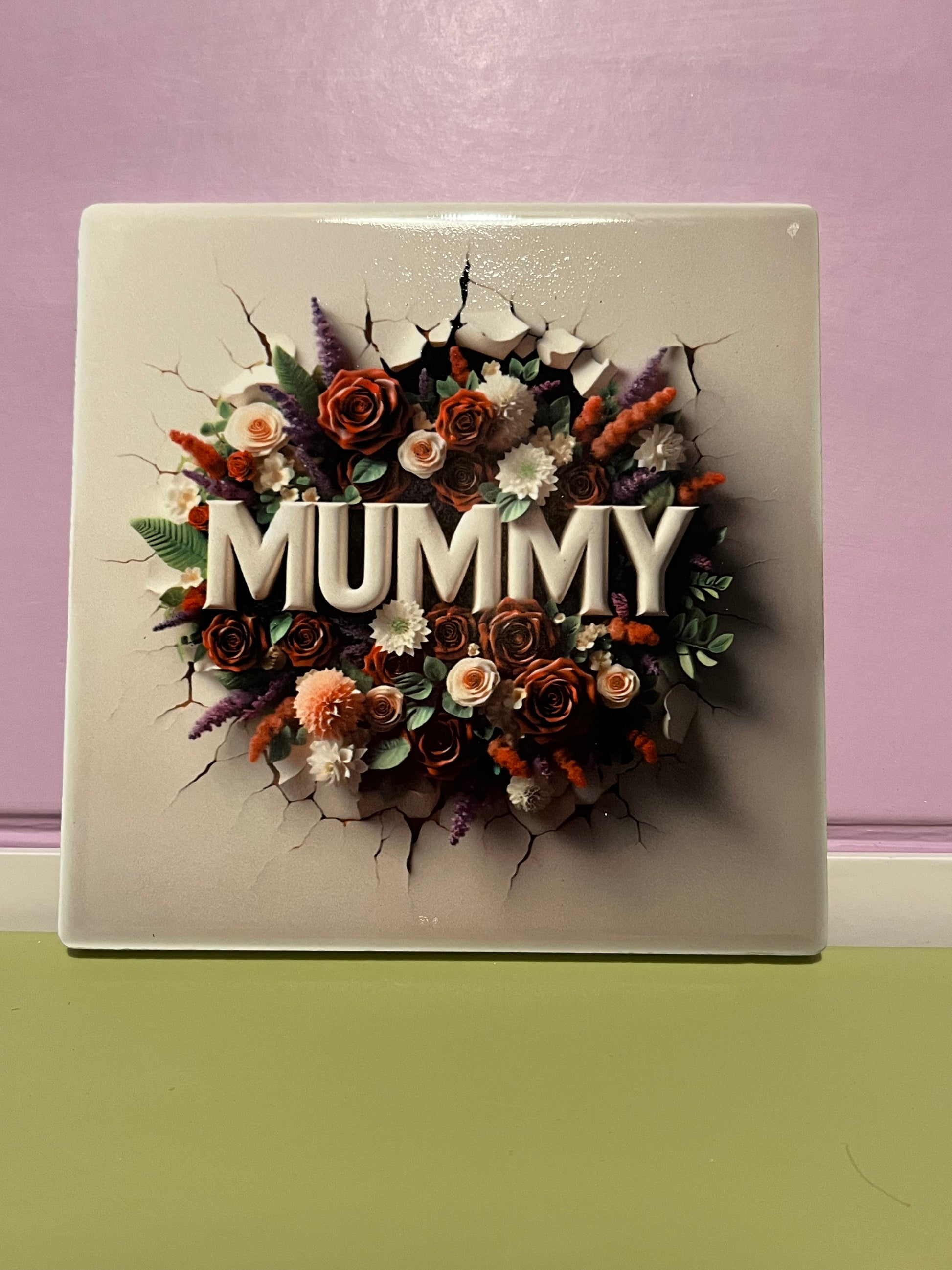 Decorative ceramic coaster with floral design and 'MUMMY' text 