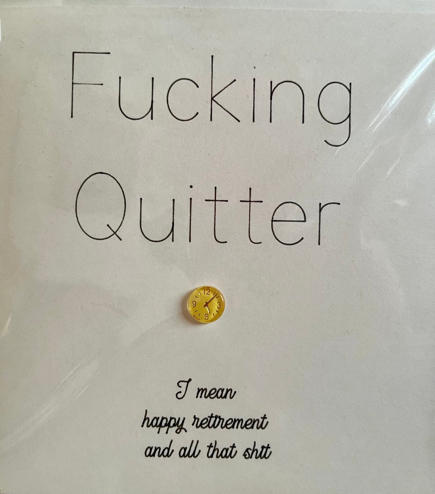Card with text 'Fucking Quitter' and a gold coin on a white background