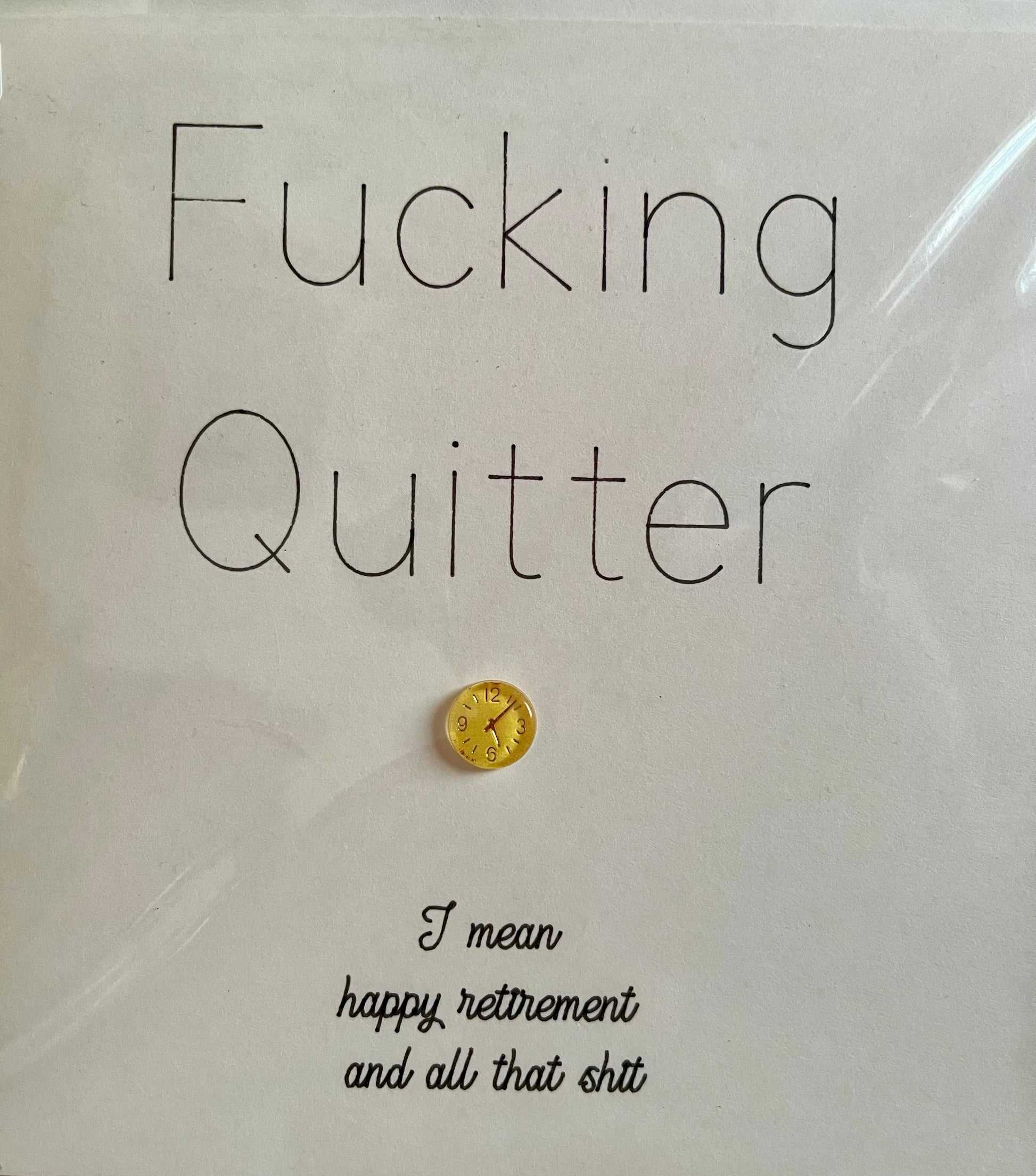 Card with text 'Fucking Quitter' and a gold coin on a white background