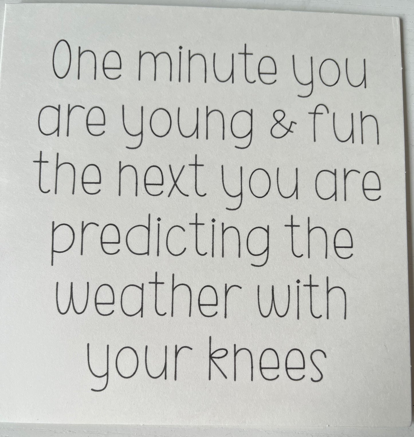 White card with black text on a white background