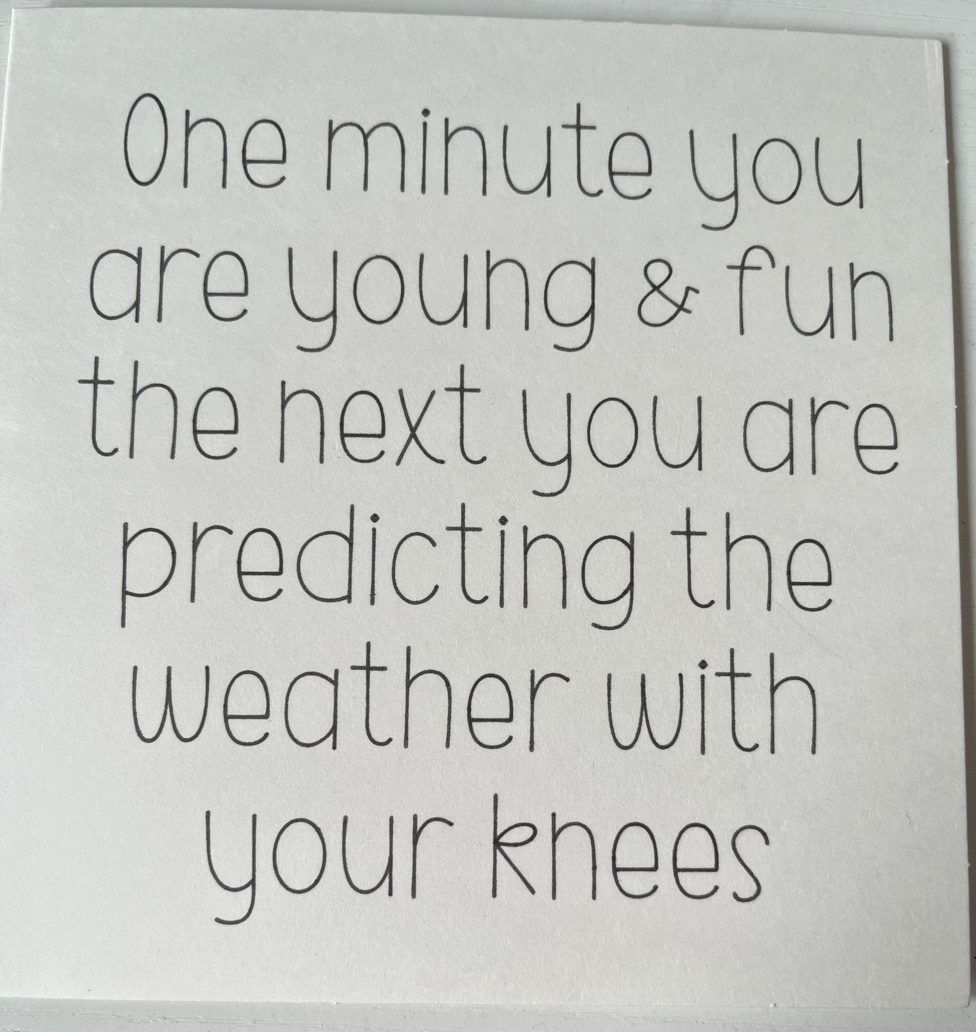 White card with black text on a white background