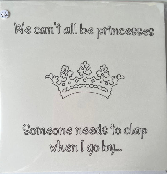 Card with text 'We can't all be princesses' and 'Someone needs to clap when I go by...' on a white background.
