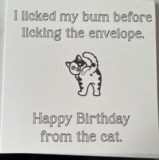 Card with a cat illustration and humorous text on a white background
