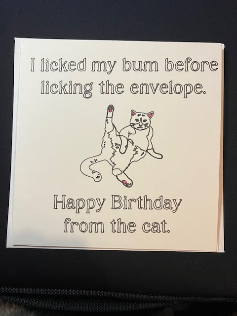 Birthday card with a cat illustration and humorous text 