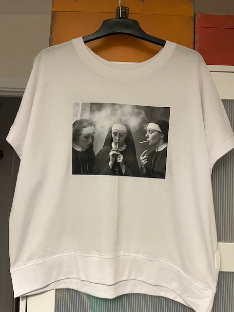 White T-shirt with a black and white graphic of smoking nuns