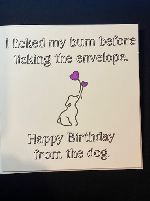 Birthday card with humorous text and 'Happy Birthday from the dog.' and a dog illustration. 
