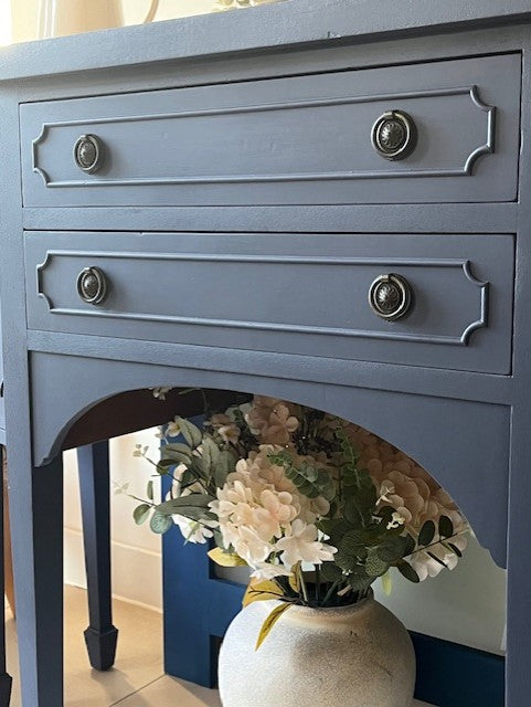 Navy blue solid wood drawers with two original handles on each
